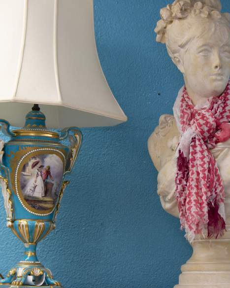 A lamp and dressed mannequin among donated goods at ZABS Place